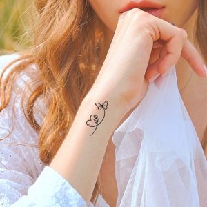 Elevate your style with Delicate Tattoos - intricate designs that whisper elegance, enhancing your natural beauty with subtle, intricate ink art perfect for the modern minimalist.