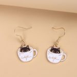 Add a purr-fect touch to your outfit with our charming cat earrings. These delightful accessories feature intricately designed feline faces, tails, or playful poses.